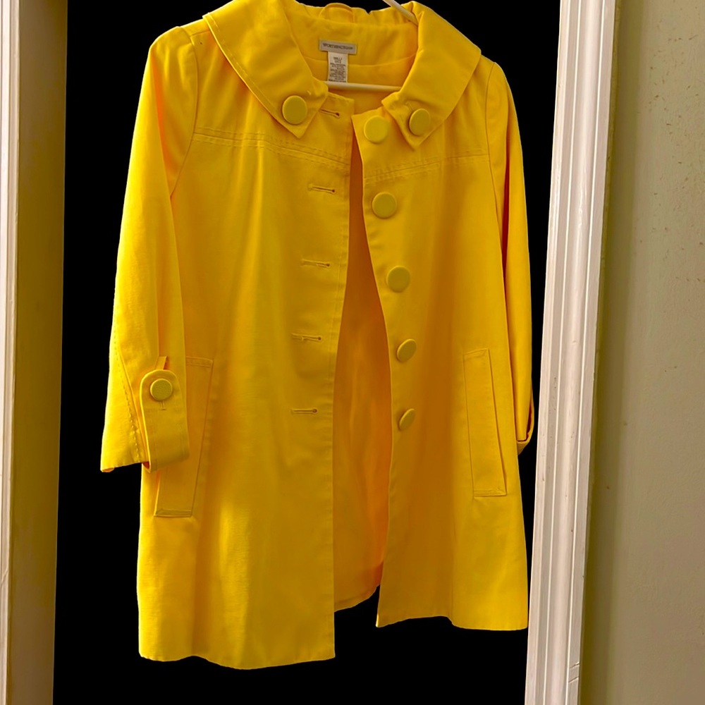 Butter yellow overcoat.